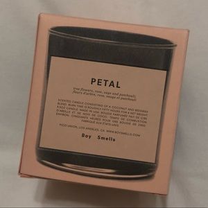 Boy smells candle in Petal